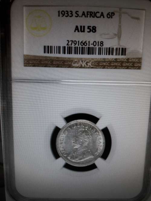 1933 SILVER 6 PENCE NGC GRADED AU58